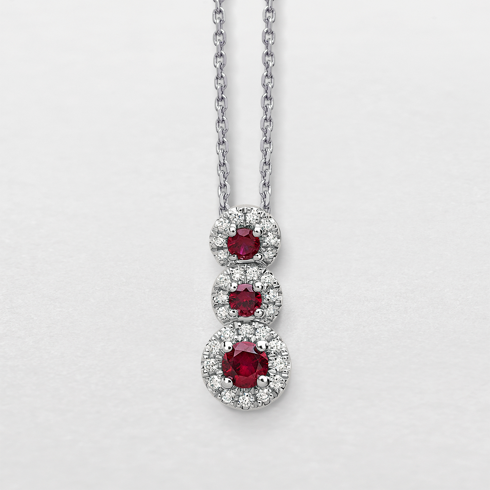 white gold with diamonds and rubies necklace