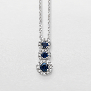 white gold with diamonds and sapphires necklace