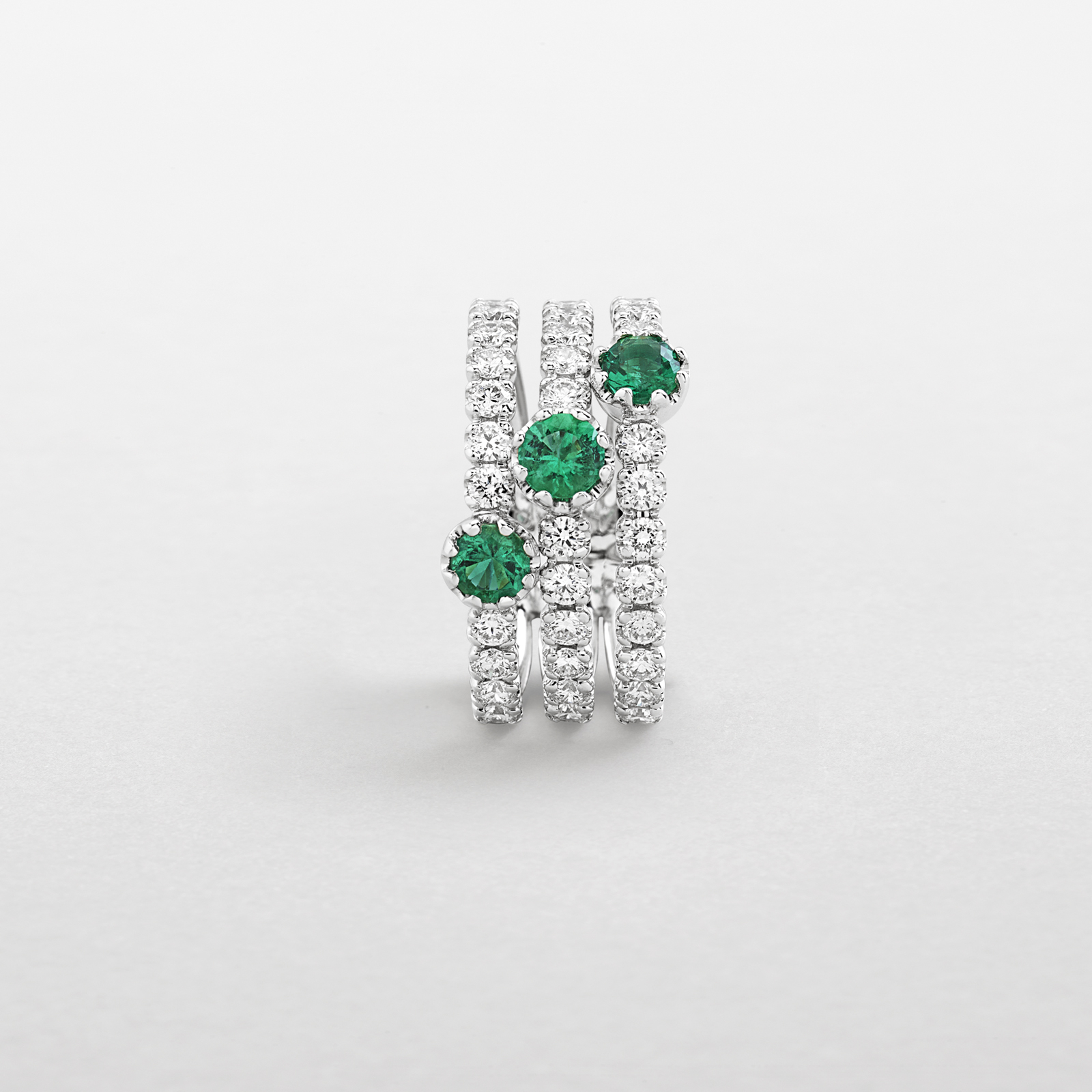 white gold with diamonds and emeralds ring
