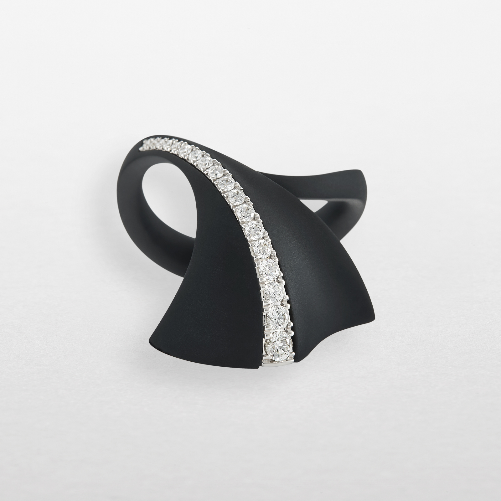 Ring in black titanium, white gold and diamonds