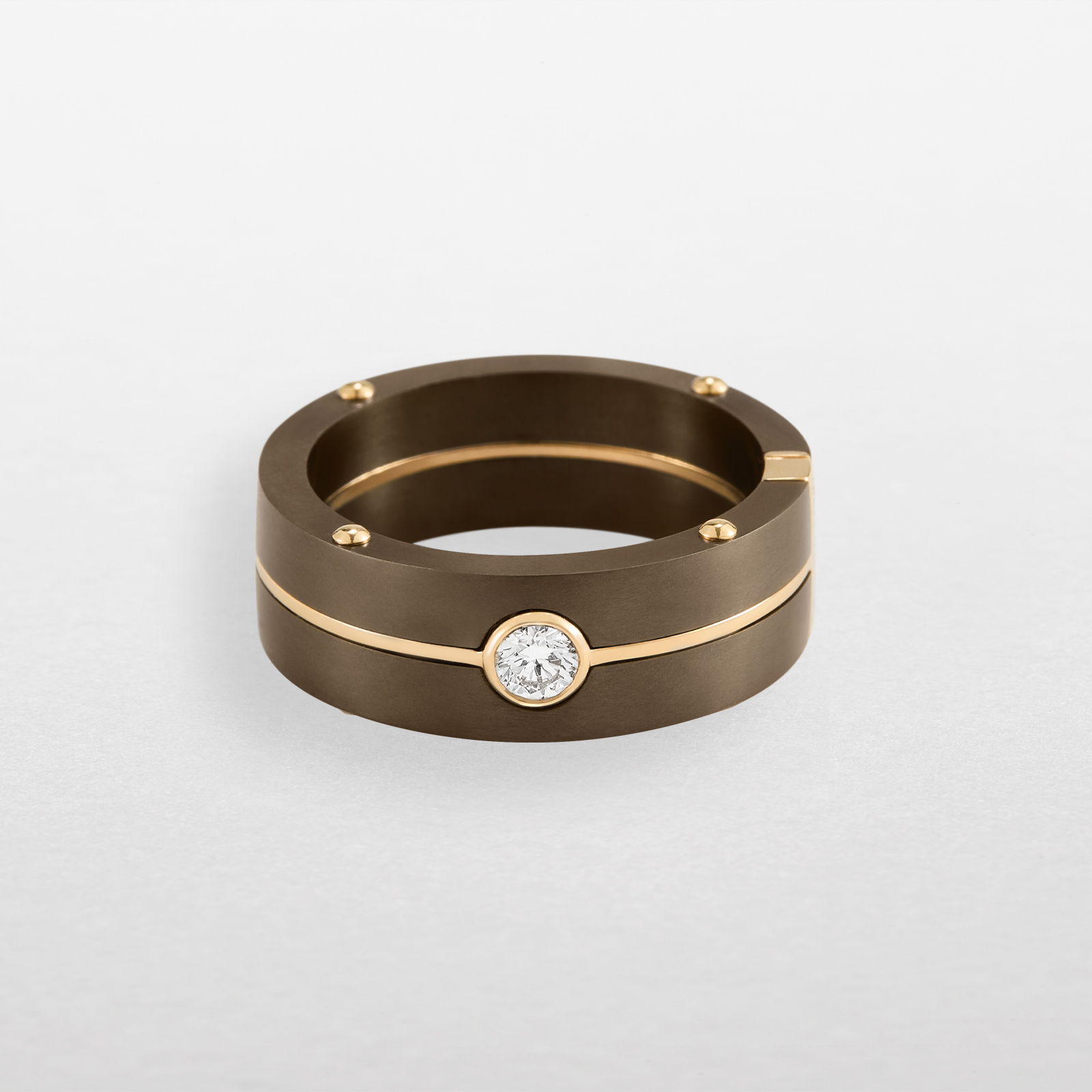 anello in titanio chocolate, oro rosa e diamante