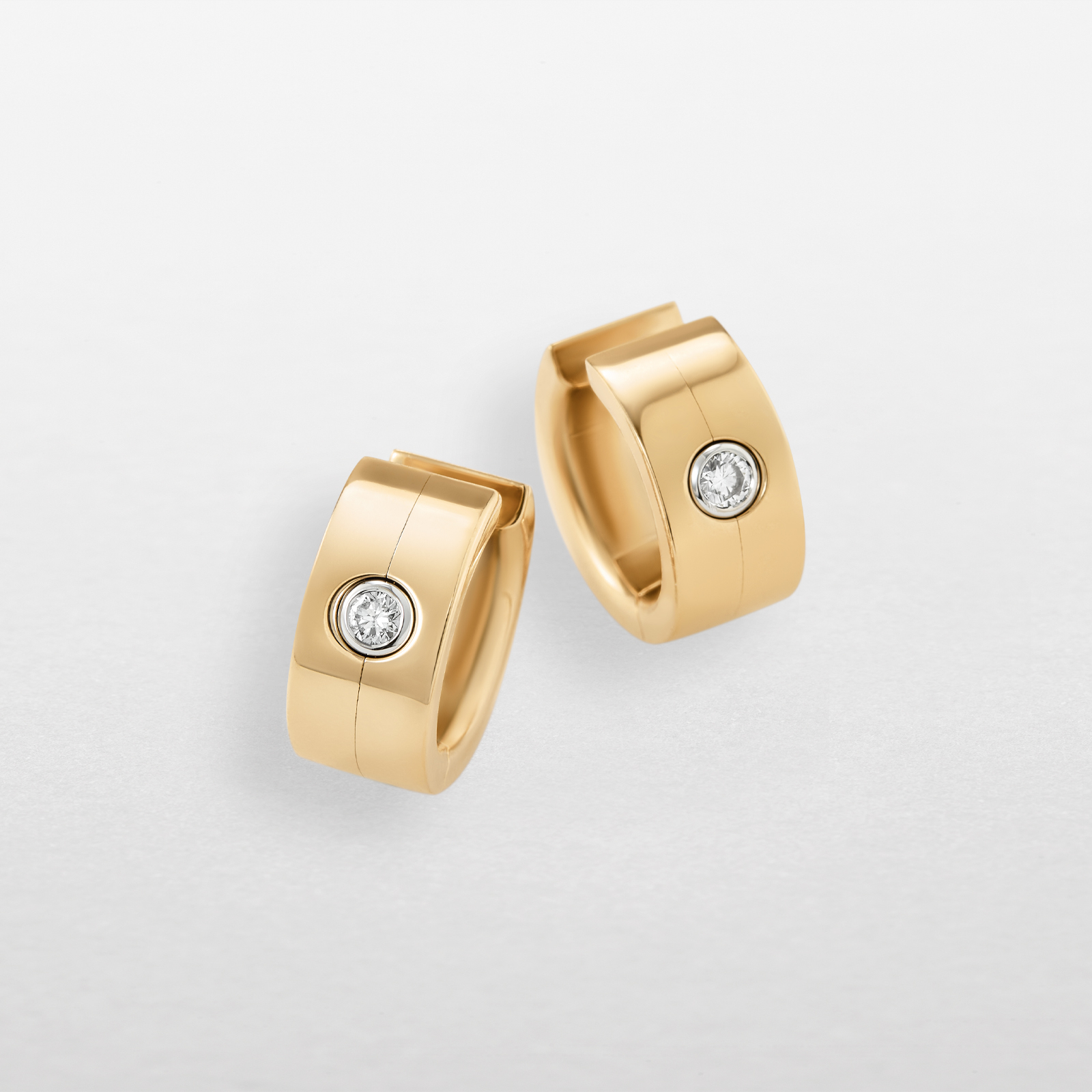 Earrings in rose and white gold with diamonds