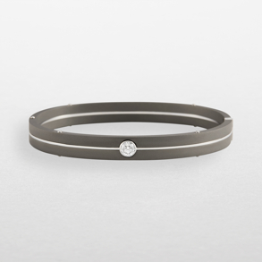 bracciale in titanio grigio, oro bianco e diamante