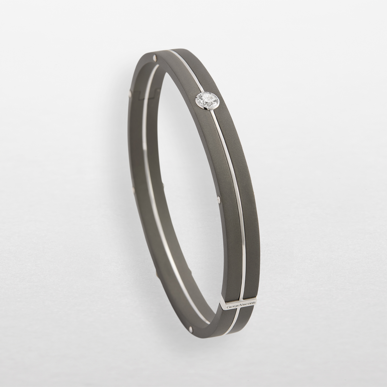 Bracelet in grey titanium, white gold and diamond