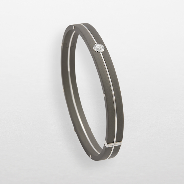 bracciale in titanio grigio, oro bianco e diamante