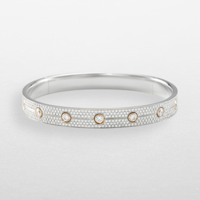 Bracelet in white and rose gold with diamonds