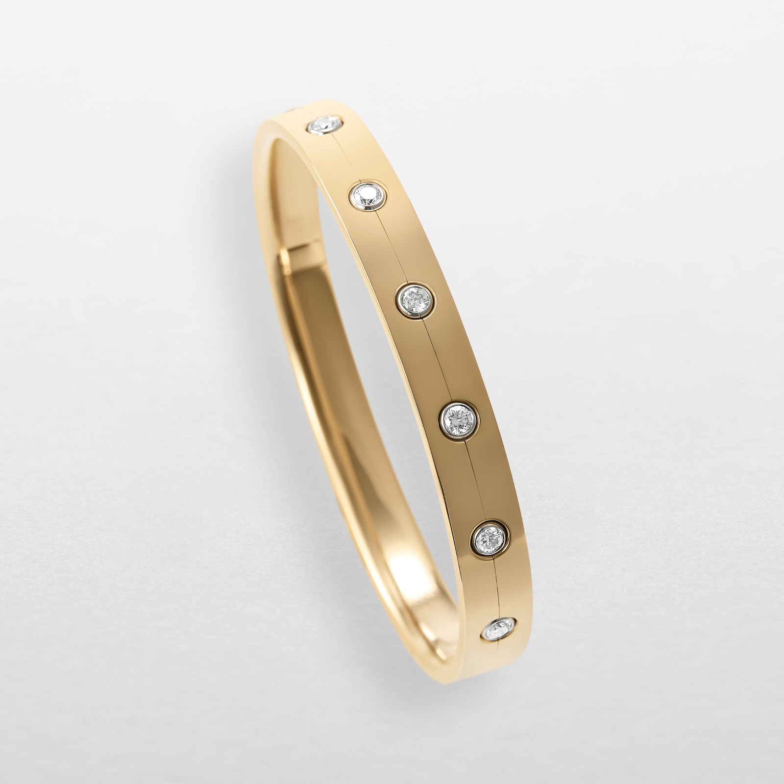 bracciale in oro rosa, bianco e diamanti