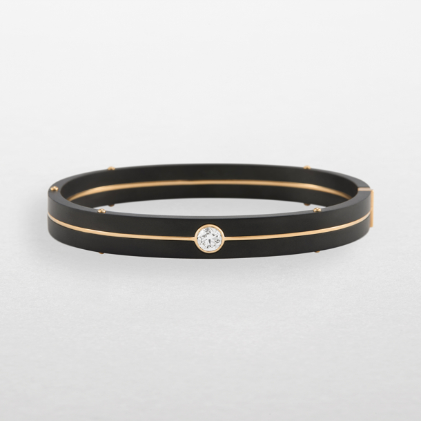bracciale in titanio nero, oro rosa e diamante