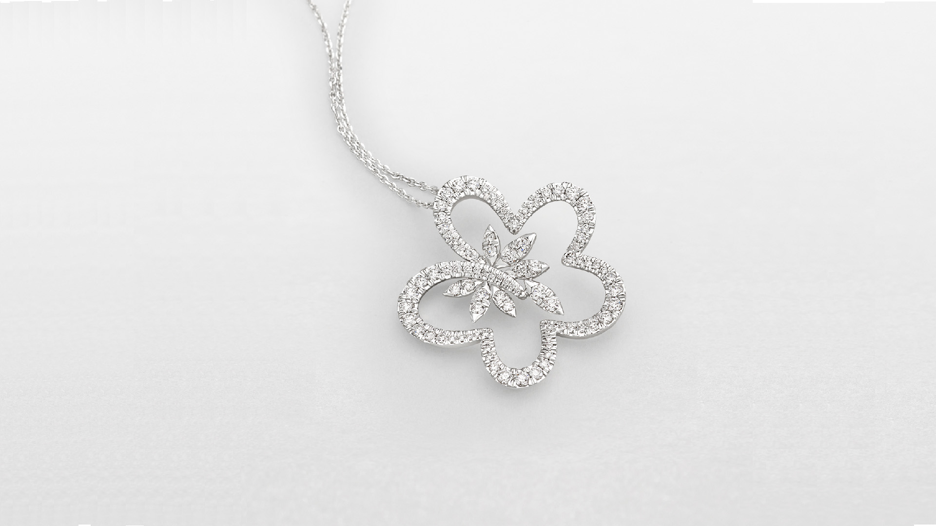 Collana forma a fiore in oro bianco e diamanti. Collana da donna per brillare 