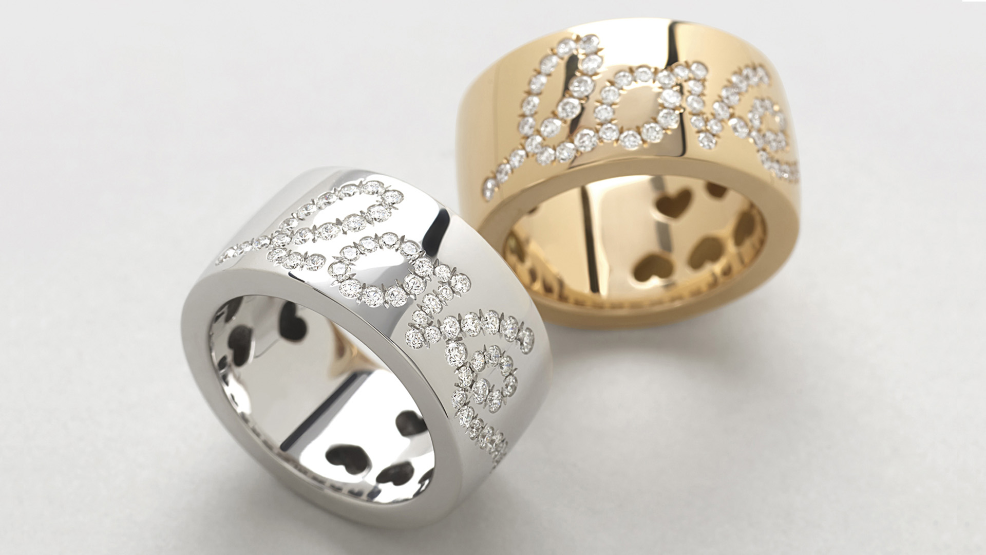 Anello in oro bianco, rosa con scritta LOVE di diamanti. Scopri i gioielli Giorgio Visconti