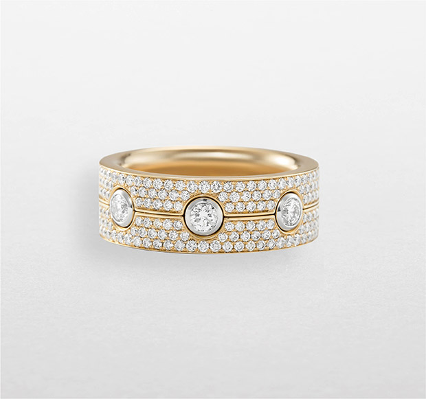 Anello a fascia da donna Bubbles Giorgio Visconti in oro rosa con pavé di diamanti taglio brillante e diamanti centrali incastonati in oro bianco
