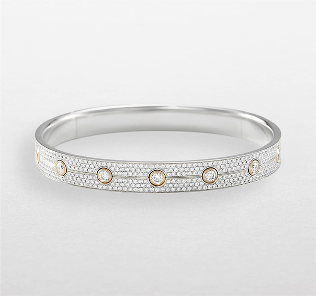 Bracciale rigido da donna Bubbles Giorgio Visconti in oro bianco con pavé di diamanti taglio brillante e diamanti centrali incastonati in oro rosa