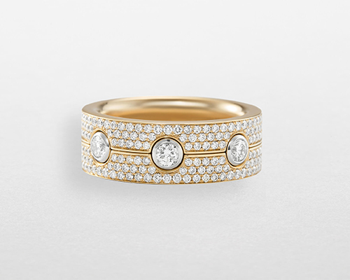 Anello a fascia da donna Bubbles di Giorgio Visconti in oro rosa con pavé di diamanti taglio brillante e diamanti centrali