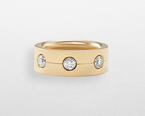 Anello a fascia da donna Bubbles di Giorgio Visconti in oro rosa con tre diamanti centrali